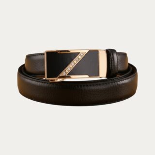 Ceinture automatique femme en cuir noir avec boucle rectangulaire dorée sertie de cristaux, style graphique sur fond uni.